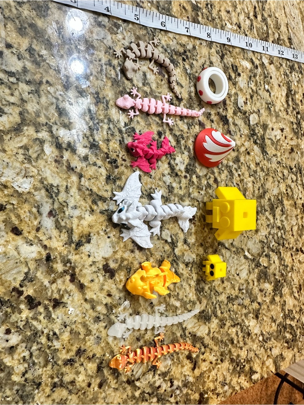 Assorted Kids Toy Figures and Blocks - Yellow, White, Pink, Orange, Brown